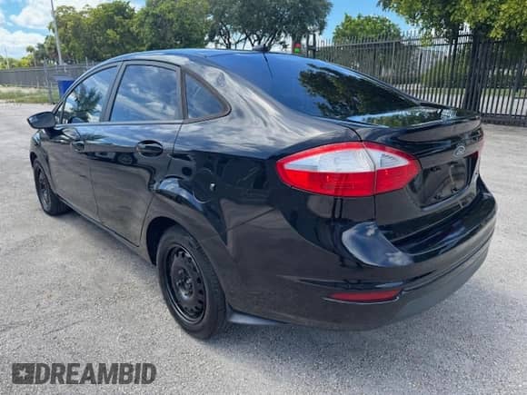 2016 Ford Fiesta S с VIN 3FADP4AJ0GM138016, выставлен на аукционе Copart как лот 69889705 с пробегом 78 813 миль миль и Чистый • Clean title. История ставок и продаж доступна на DreamBid. Изображение 2.