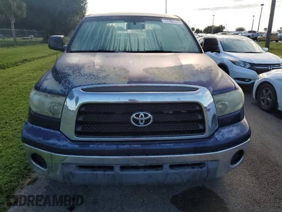 2007 Toyota Tundra SR5 z VIN 5TBET54117S455677, wystawiony jako Copart lot #74101544 z przebiegiem Nie podano mil oraz Szkoda całkowita • Salvage title. Historia ofert i sprzedaży dostępna na DreamBid. Obrazek 5.