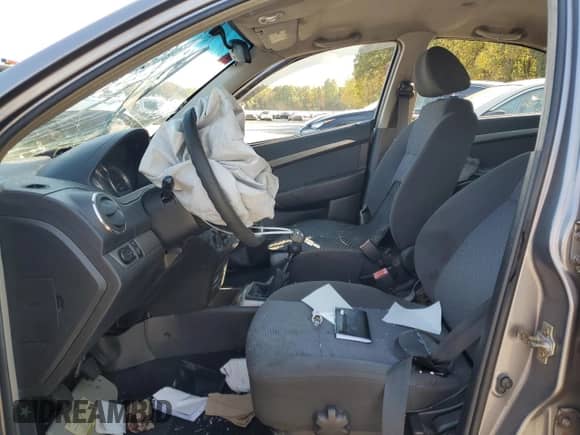 2007 Chevrolet Aveo LT z VIN KL1TG56697B068319, wystawiony jako Copart lot #75832024 z przebiegiem Nie podano mil oraz Szkoda całkowita • Salvage title. Historia ofert i sprzedaży dostępna na DreamBid. Obrazek 7.