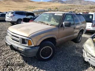 1997 Chevrolet Blazer LS с VIN 1GNCT18W5VK104375, выставлен на аукционе Copart как лот 75667574 с пробегом 199 351 миль миль и Чистый • Clean title. История ставок и продаж доступна на DreamBid. Изображение 1.