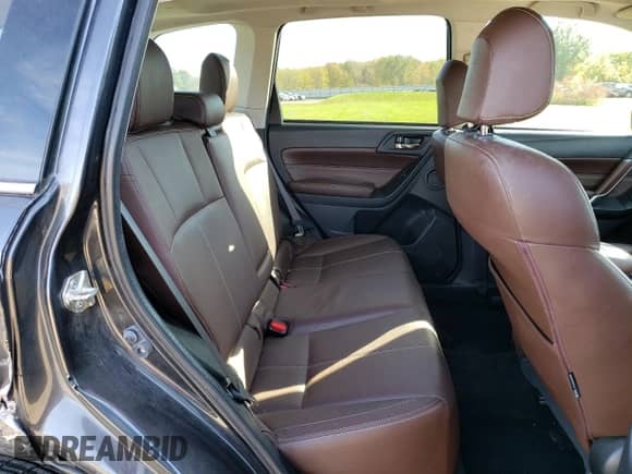 2017 Subaru Forester Touring z VIN JF2SJGWCXHH543032, wystawiony jako Copart lot #82477415 z przebiegiem 154 499 mil mil oraz Szkoda całkowita • Salvage title. Historia ofert i sprzedaży dostępna na DreamBid. Obrazek 11.