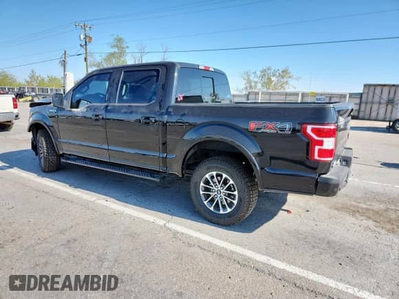 2020 Ford F-150 XL with VIN 1FTEW1E44LKD60628, listed as a Copart auction lot 62777675 with 96,121 mi miles and Salvage title. Bid and sale history available at DreamBid. Image 2.