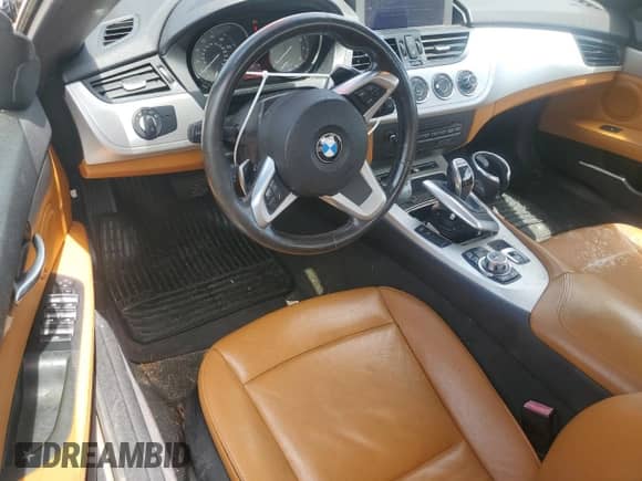2012 BMW Z4 sDrive28i с VIN WBALL5C50CE716958, выставлен на аукционе Copart как лот 56932865 с пробегом 99 523 миль миль и Чистый • Clean title. История ставок и продаж доступна на DreamBid. Изображение 9.