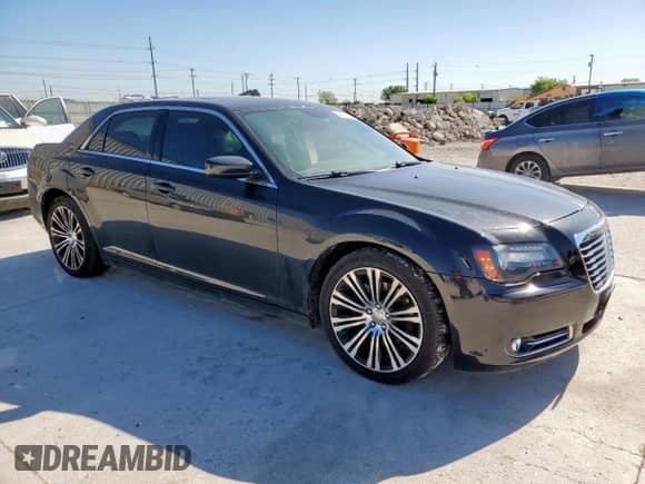 2014 Chrysler 300 S with VIN 2C3CCABT7EH119561, listed as a Copart auction lot 53995655 with 131,077 mi miles and Salvage title. Bid and sale history available at DreamBid. Image 4.