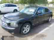 2010 Dodge Charger with VIN 2B3CA4CD8AH236233, listed as a IAAI auction lot 43180917 with 138,323 mi miles and . Bid and sale history available at DreamBid. Image 2.