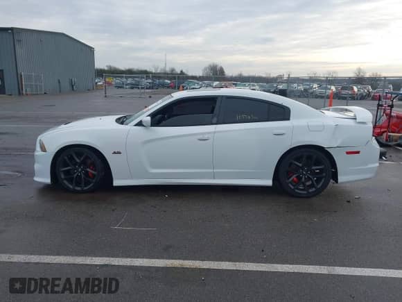 2013 Dodge Charger SRT-8 z VIN 2C3CDXEJXDH675646, wystawiony jako IAAI lot #41464139 z przebiegiem 105 583 mil mil oraz . Historia ofert i sprzedaży dostępna na DreamBid. Obrazek 14.