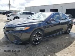 2019 Toyota Camry LE с VIN 4T1B11HK7KU772276, выставлен на аукционе Copart как лот 85113915 с пробегом 85 306 миль миль и Списание • Salvage title. История ставок и продаж доступна на DreamBid. Изображение 1.