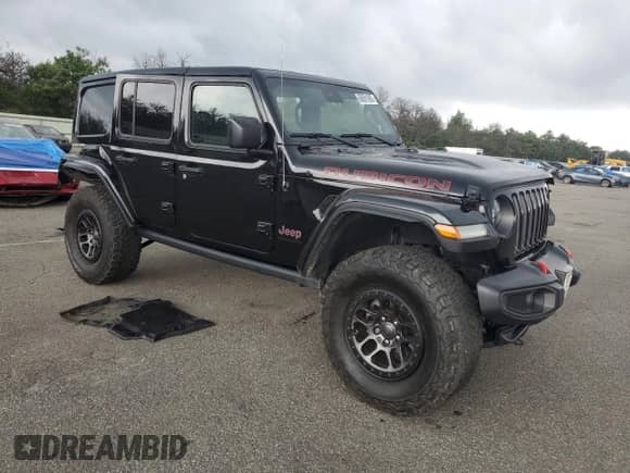 2023 Jeep Wrangler Rubicon z VIN 1C4JJXFG6PW504610, wystawiony jako Copart lot #66691695 z przebiegiem 32 179 mil mil oraz Szkoda całkowita • Salvage title. Historia ofert i sprzedaży dostępna na DreamBid. Obrazek 4.