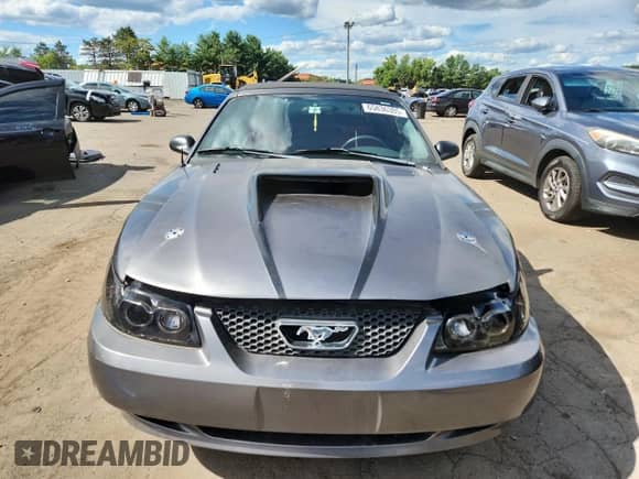 2002 Ford Mustang GT Deluxe z VIN 1FAFP45XX2F122762, wystawiony jako Copart lot #65836385 z przebiegiem Nie podano mil oraz Nie do naprawy • Non repairable. Historia ofert i sprzedaży dostępna na DreamBid. Obrazek 5.