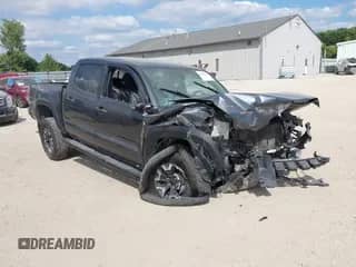 2022 Toyota Tacoma SR with VIN 3TMCZ5AN5NM526249, listed as a IAAI auction lot 43059873 with 36,641 mi miles and . Bid and sale history available at DreamBid. Image 1.