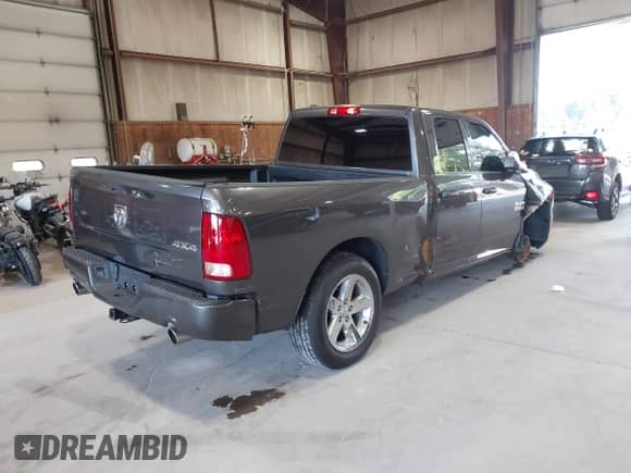 2014 Ram 1500 Express z VIN 1C6RR7FTXES469073, wystawiony jako IAAI lot #43109122 z przebiegiem 164 219 mil mil oraz . Historia ofert i sprzedaży dostępna na DreamBid. Obrazek 4.