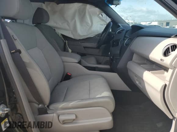 2011 Honda Pilot LX z VIN 5FNYF3H2XBB015358, wystawiony jako Copart lot #68182175 z przebiegiem Nie podano mil oraz Szkoda całkowita • Salvage title. Historia ofert i sprzedaży dostępna na DreamBid. Obrazek 7.