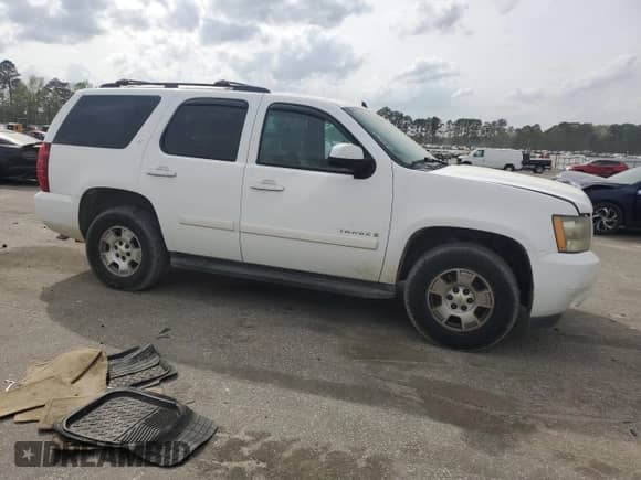 2009 Chevrolet Tahoe 1LT with VIN 1GNFC23049R167714, listed as a Copart auction lot 51827975 with 222,544 mi miles and Clean title. Bid and sale history available at DreamBid. Image 4.