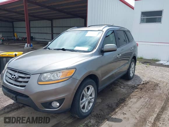 2011 Hyundai Santa Fe SE with VIN 5XYZHDAG5BG005128, listed as a IAAI auction lot 42919665 with 177,631 mi miles and . Bid and sale history available at DreamBid. Image 2.