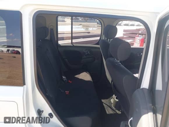 2013 Nissan Cube S z VIN JN8AZ2KR6DT303049, wystawiony jako IAAI lot #43471604 z przebiegiem 124 551 mil mil oraz . Historia ofert i sprzedaży dostępna na DreamBid. Obrazek 8.