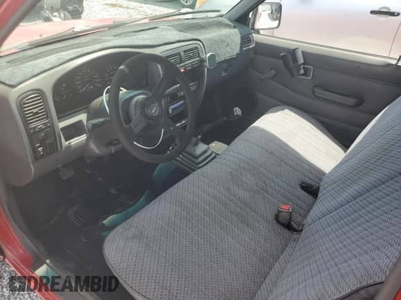 1997 Nissan Frontier XE with VIN 1N6SD11S5VC384265, listed as a Copart auction lot 62367885 with 186,882 mi miles and Salvage title. Bid and sale history available at DreamBid. Image 8.