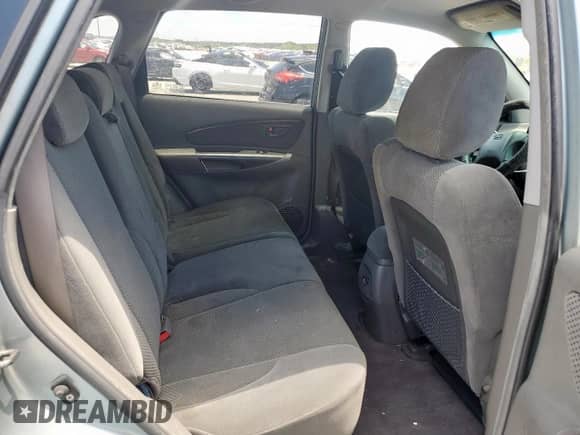 2007 Hyundai Tucson SE z VIN KM8JN12D87U612991, wystawiony jako Copart lot #62695105 z przebiegiem 205 940 mil mil oraz Szkoda całkowita • Salvage title. Historia ofert i sprzedaży dostępna na DreamBid. Obrazek 11.