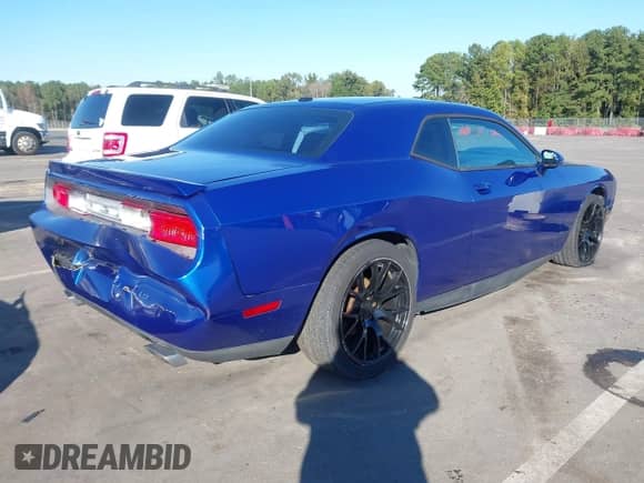 2012 Dodge Challenger SXT z VIN 2C3CDYAG2CH239064, wystawiony jako IAAI lot #43456376 z przebiegiem 228 724 mil mil oraz . Historia ofert i sprzedaży dostępna na DreamBid. Obrazek 4.