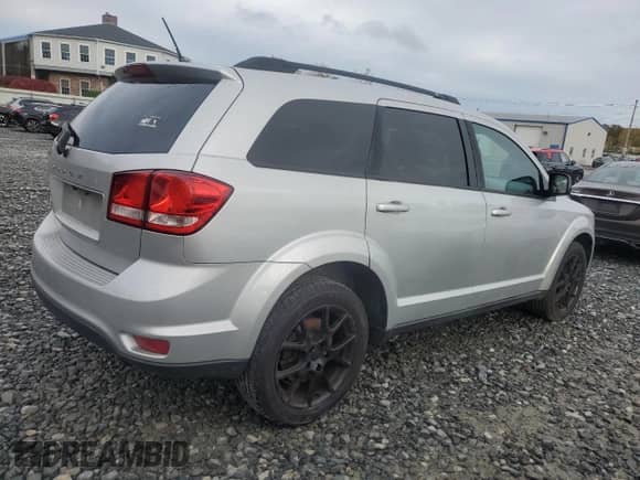 2014 Dodge Journey SXT with VIN 3C4PDCBB1ET173782, listed as a Copart auction lot 86882255 with 57,147 mi miles and Clean title. Bid and sale history available at DreamBid. Image 3.