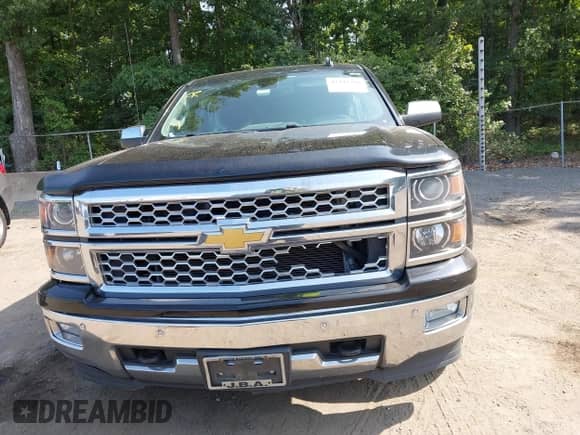 2014 Chevrolet Silverado 1500 LTZ z VIN 1GCVKSECXEZ399579, wystawiony jako IAAI lot #42442708 z przebiegiem 167 046 mil mil oraz . Historia ofert i sprzedaży dostępna na DreamBid. Obrazek 12.