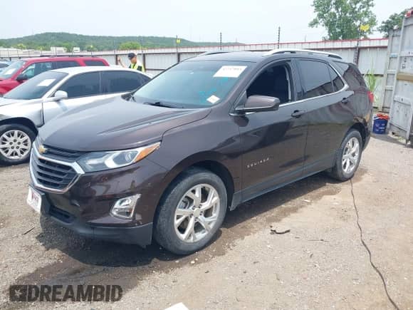 2020 Chevrolet Equinox LT z VIN 2GNAXLEX9L6125931, wystawiony jako IAAI lot #42747803 z przebiegiem 59 100 mil mil oraz . Historia ofert i sprzedaży dostępna na DreamBid. Obrazek 2.