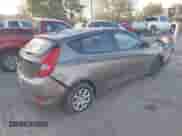 2014 Hyundai Accent GS z VIN KMHCT5AE6EU165851, wystawiony jako IAAI lot #41313636 z przebiegiem 161 054 mil mil oraz . Historia ofert i sprzedaży dostępna na DreamBid. Obrazek 4.