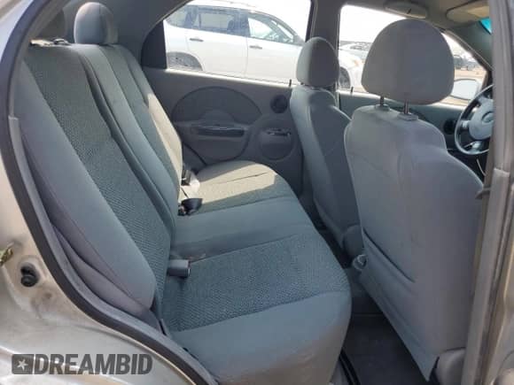 2004 Chevrolet Aveo LS z VIN KL1TJ526X4B142799, wystawiony jako Copart lot #59663475 z przebiegiem 185 731 mil mil oraz Szkoda całkowita • Salvage title. Historia ofert i sprzedaży dostępna na DreamBid. Obrazek 10.