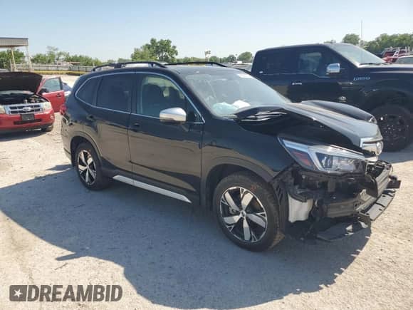 2020 Subaru Forester Touring with VIN JF2SKAXC5LH431935, listed as a Copart auction lot 56291375 with 81,165 mi miles and Salvage title. Bid and sale history available at DreamBid. Image 4.