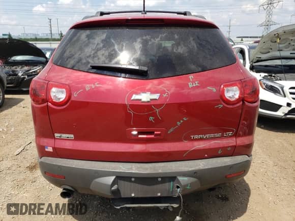 2012 Chevrolet Traverse LTZ с VIN 1GNKRLED2CJ387197, выставлен на аукционе Copart как лот 58749284 с пробегом 104 113 миль миль и Списание • Salvage title. История ставок и продаж доступна на DreamBid. Изображение 6.