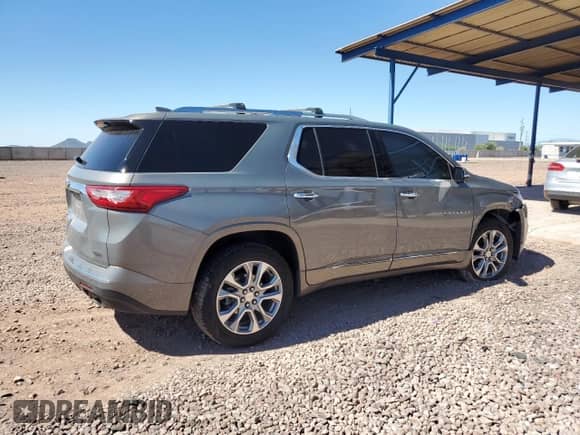 2018 Chevrolet Traverse Premier с VIN 1GNERKKWXJJ137281, выставлен на аукционе Copart как лот 84072725 с пробегом 119 794 миль миль и Списание • Salvage title. История ставок и продаж доступна на DreamBid. Изображение 3.