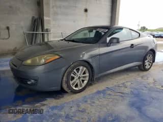 2007 Hyundai Tiburon GS с VIN KMHHM66D17U259552, выставлен на аукционе Copart как лот 80561605 с пробегом 178 114 миль миль и Списание • Salvage title. История ставок и продаж доступна на DreamBid. Изображение 1.