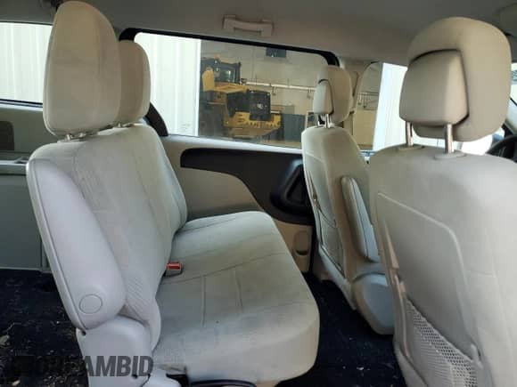 2014 Dodge Grand Caravan American Value with VIN 2C4RDGBG1ER129165, listed as a Copart auction lot 71186295 with 129,323 mi miles and Salvage title. Bid and sale history available at DreamBid. Image 11.