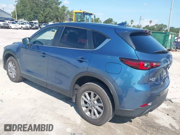 2023 Mazda CX-5 S Carbon Edition z VIN JM3KFBCM6P0112207, wystawiony jako IAAI lot #42747977 z przebiegiem 33 488 mil mil oraz . Historia ofert i sprzedaży dostępna na DreamBid. Obrazek 3.