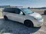 2010 Toyota Sienna XLE Limited с VIN 5TDYK4CC5AS300190, выставлен на аукционе Copart как лот 81425525 с пробегом 184 712 миль миль и Списание • Salvage title. История ставок и продаж доступна на DreamBid. Изображение 4.