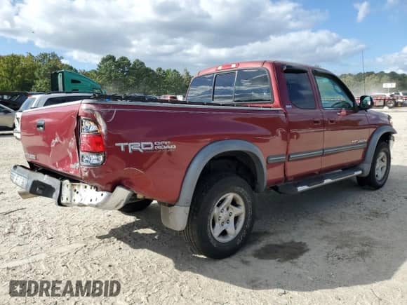 2002 Toyota Tundra SR5 z VIN 5TBRT34152S308664, wystawiony jako Copart lot #84883185 z przebiegiem 126 359 mil mil oraz Szkoda całkowita • Salvage title. Historia ofert i sprzedaży dostępna na DreamBid. Obrazek 3.