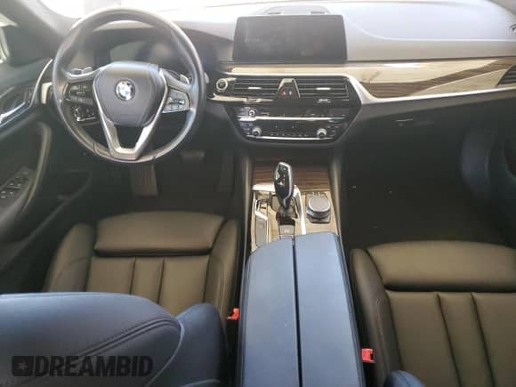 2020 BMW 5 Series 530e with VIN WBAJA9C01LCD69759, listed as a Copart auction lot 58271025 with 56,732 mi miles and Salvage title. Bid and sale history available at DreamBid. Image 8.