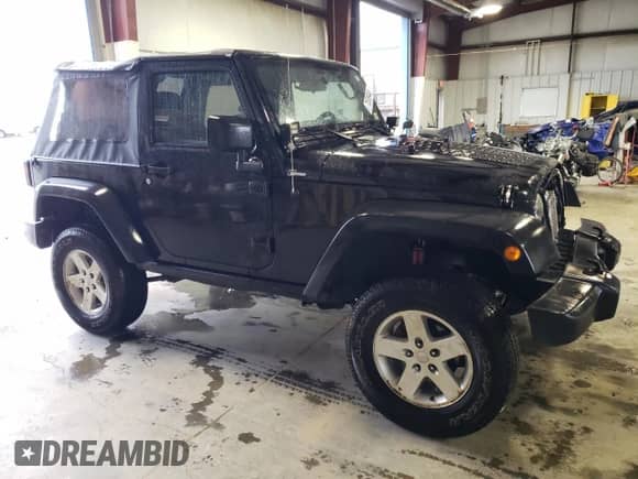 2013 Jeep Wrangler Rubicon z VIN 1C4BJWCG1DL584611, wystawiony jako Copart lot #71536944 z przebiegiem 142 975 mil mil oraz Szkoda całkowita • Salvage title. Historia ofert i sprzedaży dostępna na DreamBid. Obrazek 4.