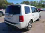 2012 Honda Pilot Touring with VIN 5FNYF3H90CB024228, listed as a IAAI auction lot 43395780 with 276,515 mi miles and . Bid and sale history available at DreamBid. Image 4.