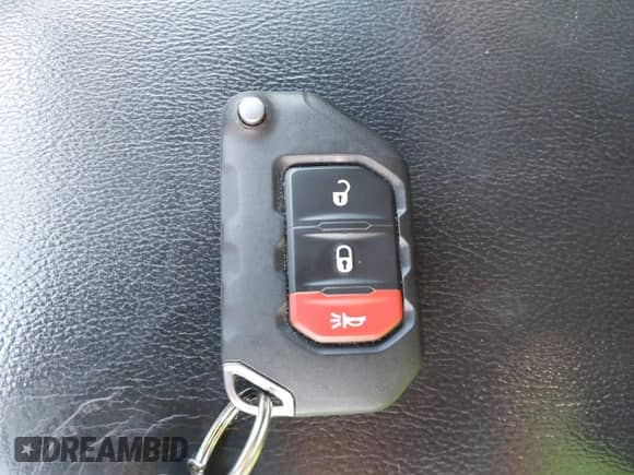 2021 Jeep Wrangler Unlimited Sahara Altitude with VIN 1C4HJXEG8MW561709, listed as a IAAI auction lot 42955764 with 67,226 mi miles and . Bid and sale history available at DreamBid. Image 11.