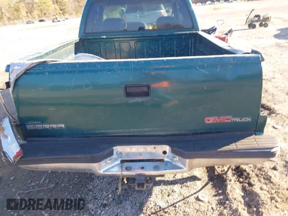 1996 GMC Sierra 1500 z VIN 2GTEC19R9T1541142, wystawiony jako IAAI lot #41375900 z przebiegiem 292 893 mil mil oraz . Historia ofert i sprzedaży dostępna na DreamBid. Obrazek 16.