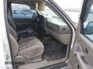 2005 Chevrolet Tahoe Police z VIN 1GNEC13Z35R233250, wystawiony jako IAAI lot #42579351 z przebiegiem 219 342 mil mil oraz . Historia ofert i sprzedaży dostępna na DreamBid. Obrazek 5.