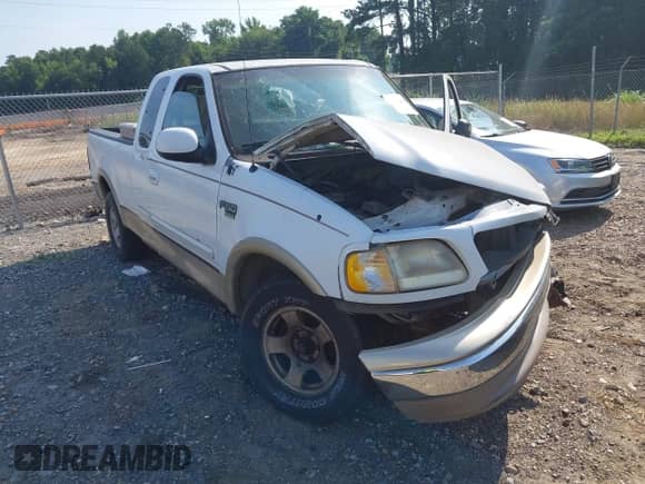 1999 Ford F-150 XL with VIN 1FTRX17L1XNA61377, listed as a IAAI auction lot 42475056 with Not provided miles and . Bid and sale history available at DreamBid. Image 1.