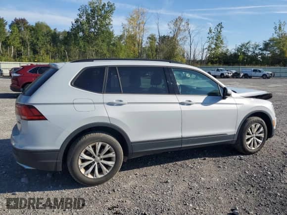 2018 Volkswagen Tiguan S с VIN 3VV0B7AX8JM021774, выставлен на аукционе Copart как лот 70980585 с пробегом 117 473 миль миль и Списание • Salvage title. История ставок и продаж доступна на DreamBid. Изображение 3.