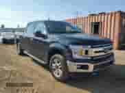 2020 Ford F-150 XL with VIN 1FTFW1E51LFA99917, listed as a Copart auction lot 69235325 with 120,295 mi miles and Salvage title. Bid and sale history available at DreamBid. Image 4.