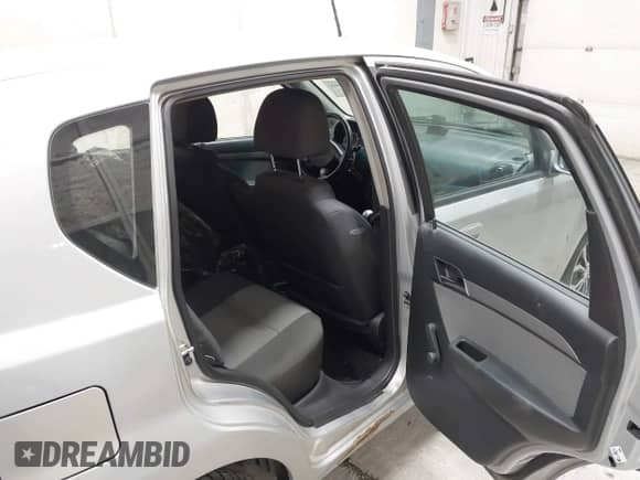 2009 Chevrolet Aveo 1LT with VIN KL1TD66E59B658607, listed as a IAAI auction lot 43496794 with 78,516 mi miles and . Bid and sale history available at DreamBid. Image 8.