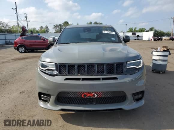 2020 Jeep Grand Cherokee SRT with VIN 1C4RJFDJ8LC158048, listed as a Copart auction lot 57426205 with 52,979 mi miles and Salvage title. Bid and sale history available at DreamBid. Image 5.