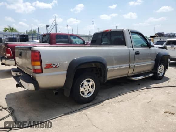 1999 Chevrolet Silverado 1500 LT with VIN 1GCEK14T3XE105915, listed as a Copart auction lot 58691285 with 167,758 mi miles and Salvage title. Bid and sale history available at DreamBid. Image 3.