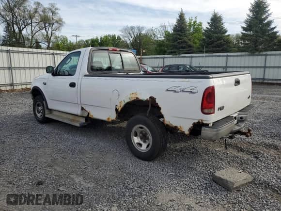 2003 Ford F-150 XL z VIN 1FTRF18253NA74054, wystawiony jako Copart lot #58710455 z przebiegiem 54 549 mil mil oraz Czysty tytuł • Clean title. Historia ofert i sprzedaży dostępna na DreamBid. Obrazek 2.