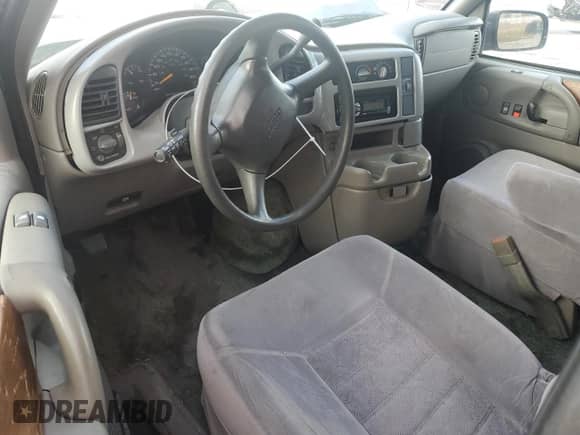 2000 Chevrolet Astro Cargo YF7 z VIN 1GBDM19W6YB176154, wystawiony jako Copart lot #85086064 z przebiegiem 139 685 mil mil oraz Szkoda całkowita • Salvage title. Historia ofert i sprzedaży dostępna na DreamBid. Obrazek 8.