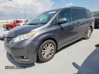 2012 Toyota Sienna XLE AAS with VIN 5TDYK3DC9CS236103, listed as a Copart auction lot 80805125 with 203,285 mi miles and Salvage title. Bid and sale history available at DreamBid. Image 1.